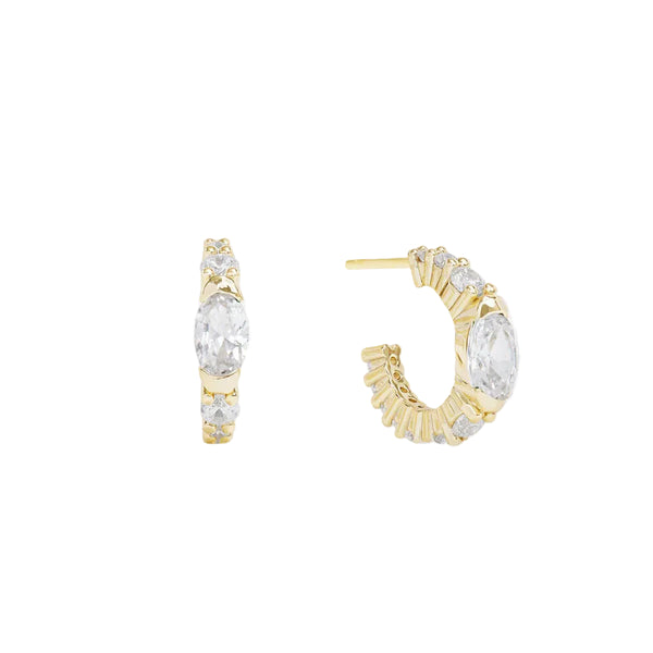 Melinda Maria The Maven Huggies earrings featuring a sleek design with sparkling CZ stones in a gold finish.