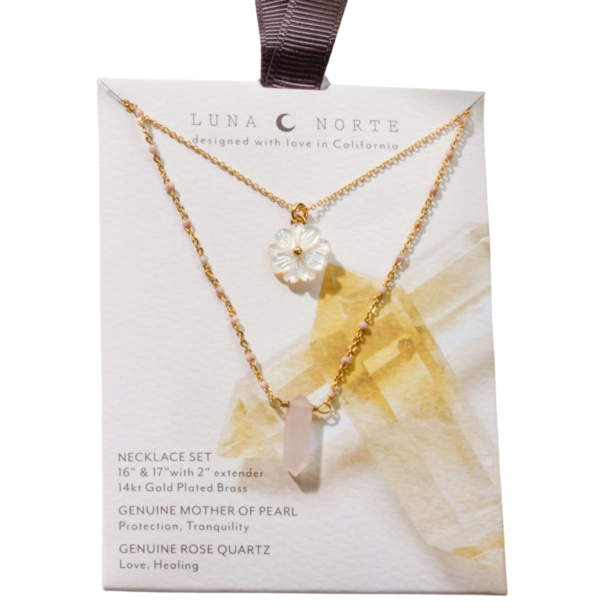Luna Norte Blooming Crystal layered necklace set with rose quartz stones, featuring delicate chains and floral-inspired design.