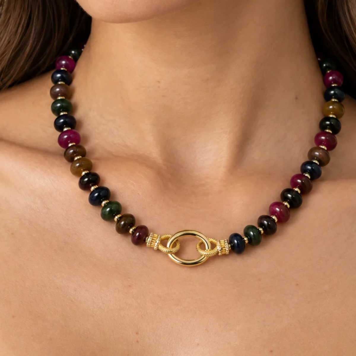 Colorful gemstone beaded necklace with charm catcher, featuring vibrant beads and decorative charm for a stylish accessory.