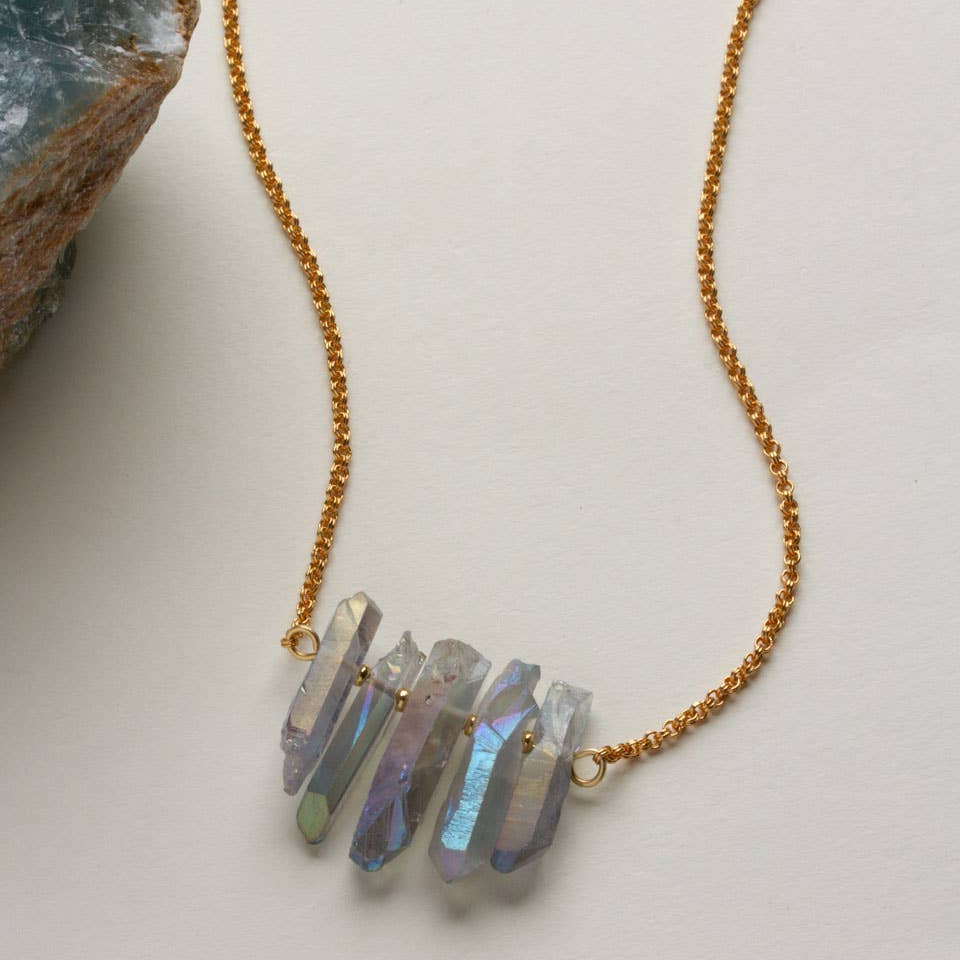 Necklace with crystal pendants on a light background
