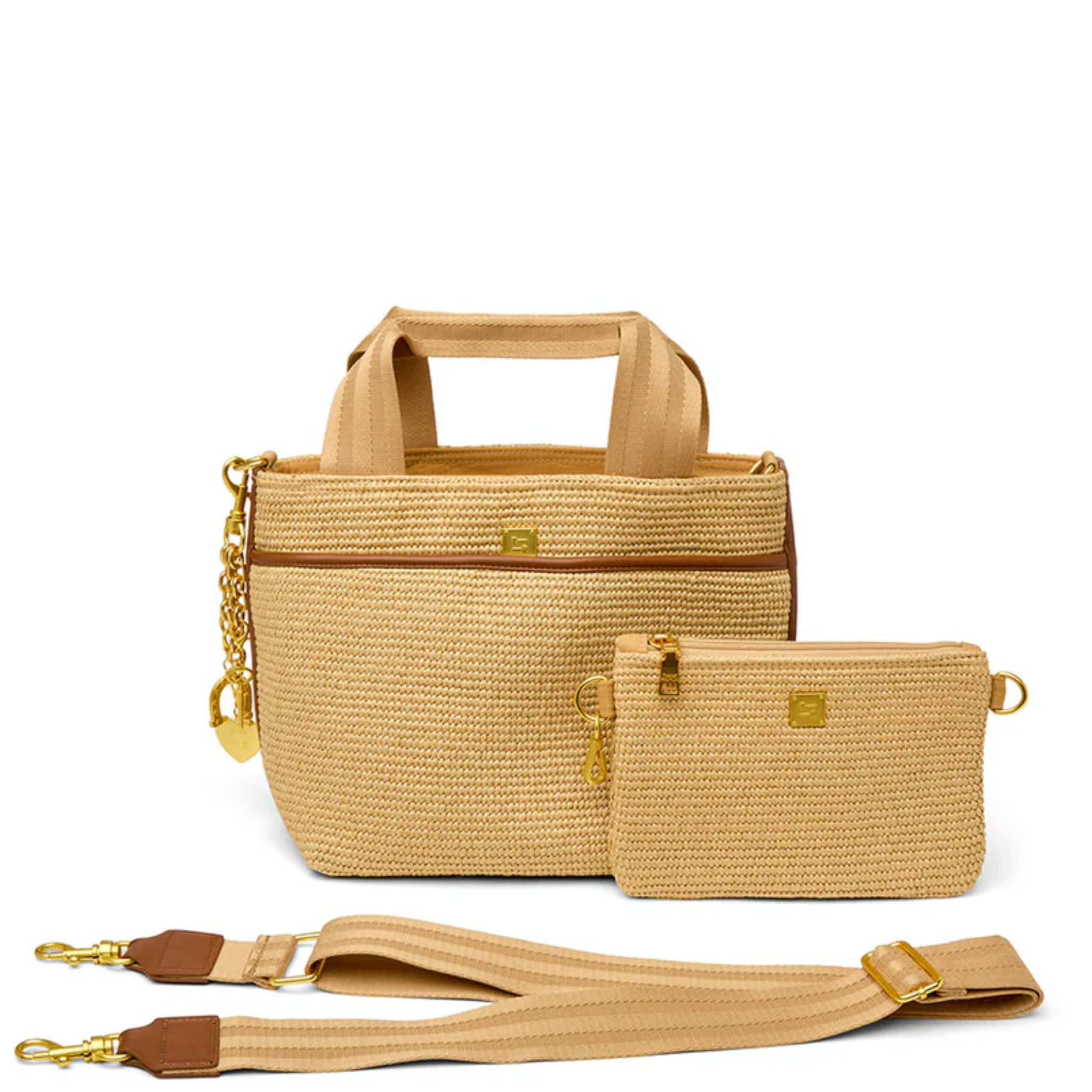 Think Royln Escape crossbody bag with heart and bow charm, featuring a stylish design and versatile carrying options.