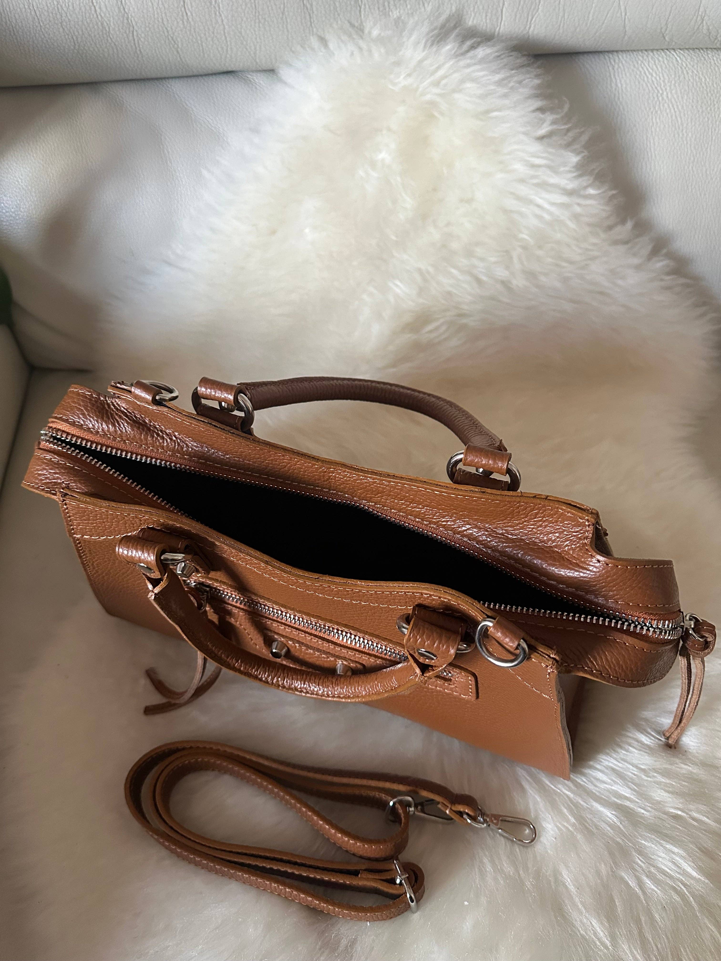 Genuine leather NEO classic handbag by Private Label with structured design and top handle, displayed on a neutral background.