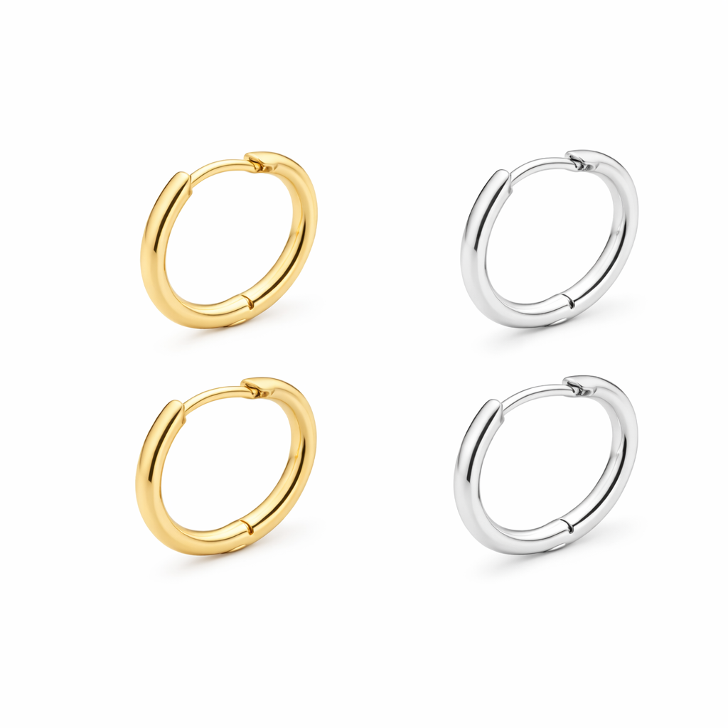 Two pairs of hoop earrings, one gold and one silver, on a white background.
