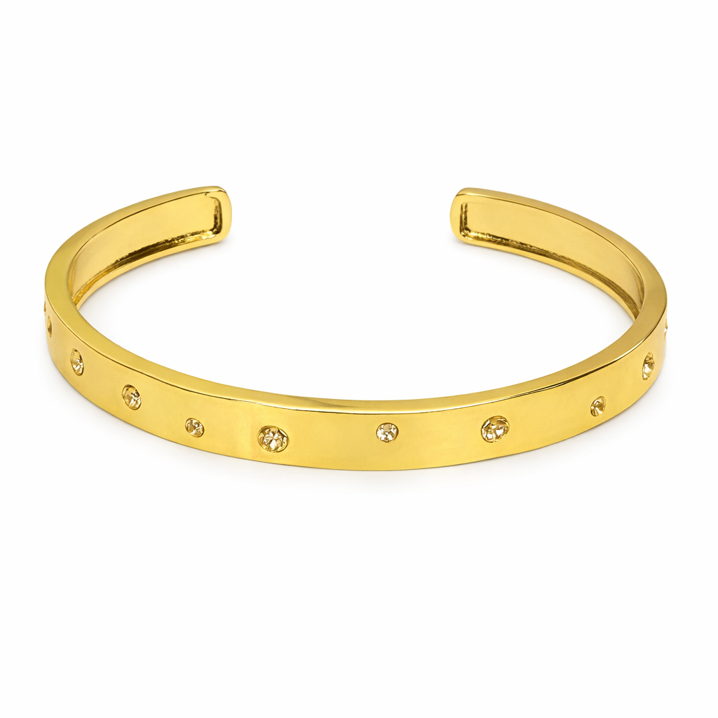 Gold bangle bracelet by The Skylar Project featuring scattered clear stones for a delicate and elegant look.